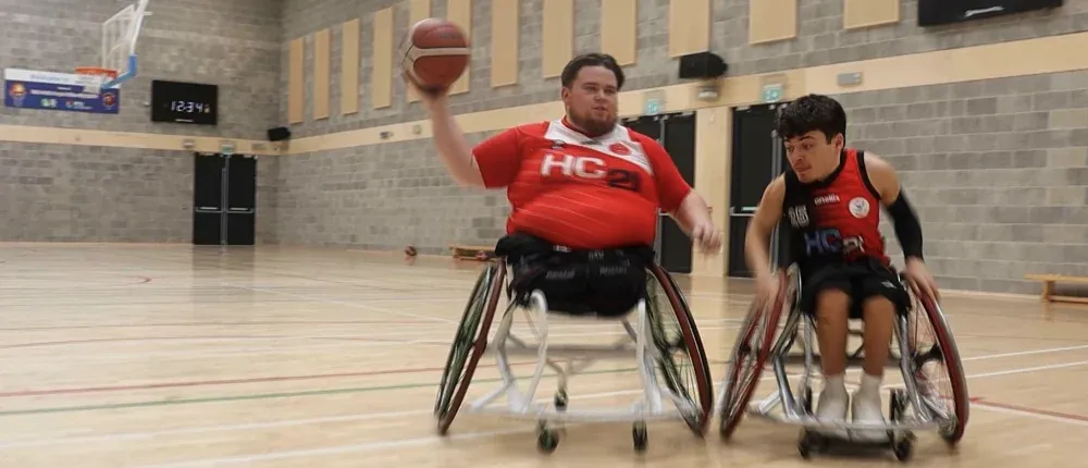 wheelchair basketball players in action on court