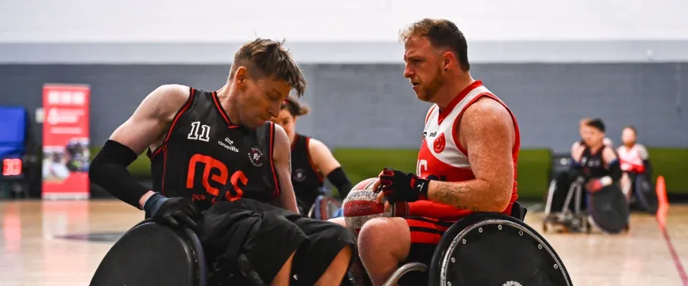 wheelchair rugby players in action