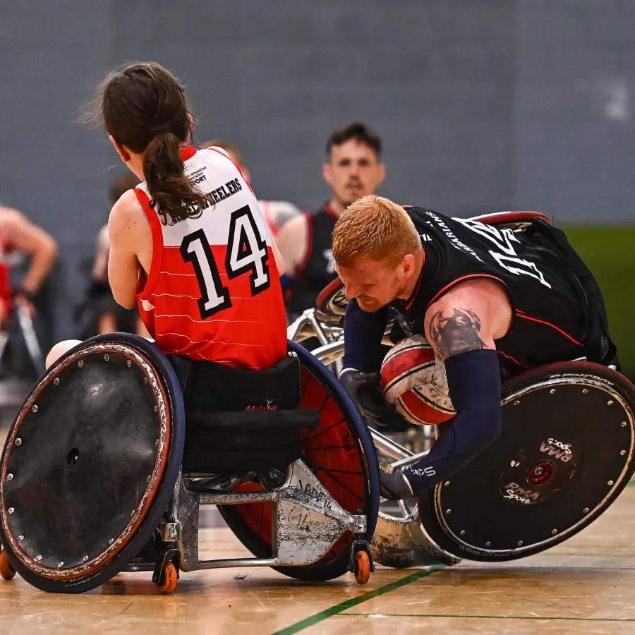 wheelchair rugby players in action